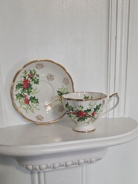 vintage bone china teacup and saucer set in the "Yuletide" pattern by Queen Anne